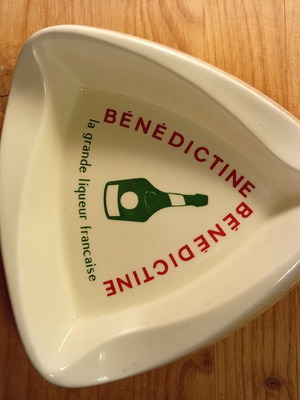 Collectible vintage ceramic ashtray with Benedictine logo used