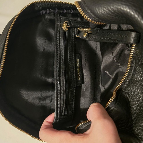 Michael Kors black backpack like new with gold details