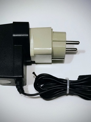 Power adapter 9V 2A like new with UK to Greek plug adapter