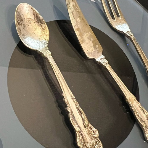 Antique silver-plated cutlery set used, knife fork and spoon in velvet box