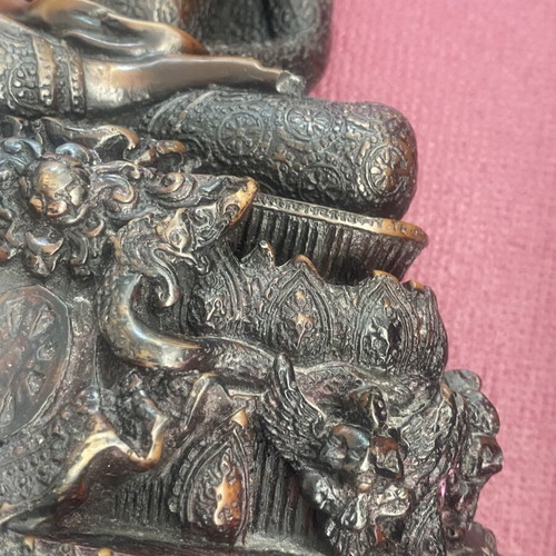 Thai Buddha statue with detailed embossed decoration