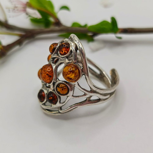 Silver ring with Baltic amber new, adjustable