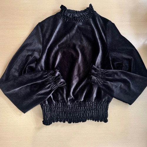 Black ribbed blouse with ruffles, like new, size M