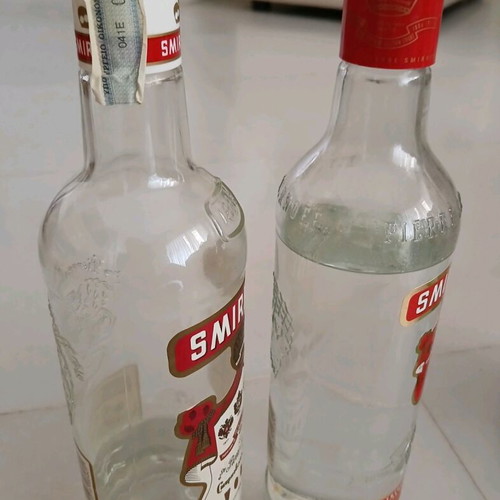 Pack of 2 old drinks, 1 vodka and 1 Bacardi, like new