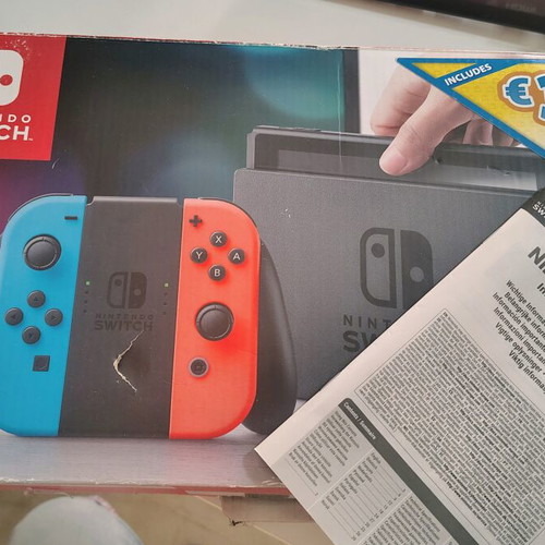 Nintendo Switch console with accessories and carrying case