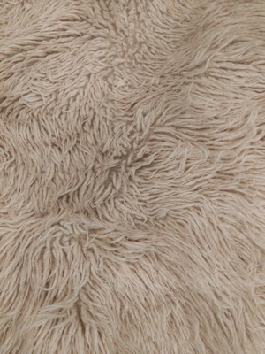 White flokati rug used, rectangular 70x130