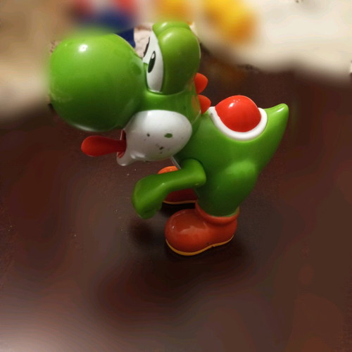 Children's toy like new with red button and tongue