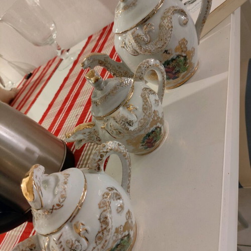 Porcelain teapot set like new