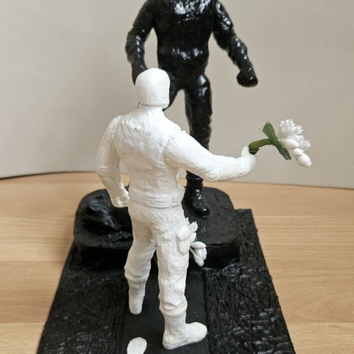 Handmade memorial statue with soldier figure