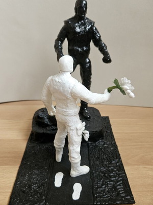 Handmade memorial statue with soldier figure