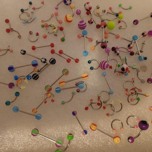 Piercing earrings set like new, 100 pieces, various designs and colors