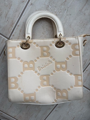 Beige handbag like new with strap