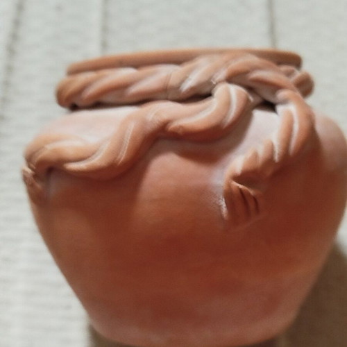 Decorative terracotta vase used, unpainted, folk art