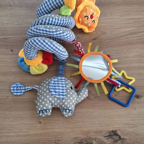 Soft spiral flower crib or stroller toy Lazarid like new