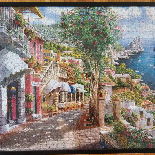 Framed puzzle like new, dimensions 0.53x0.73 m