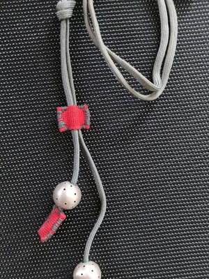 Asymmetric handmade necklace like new with red fabric and silver metal