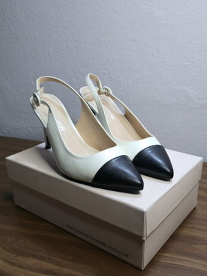 Francescomilano leather slingback pumps size 39 like new, black and white