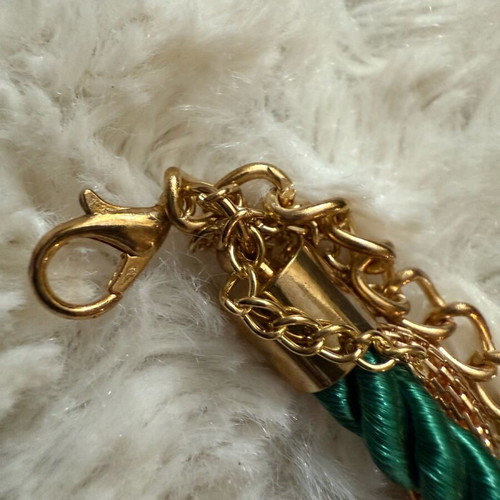 Steel bracelet new with green cord braided design