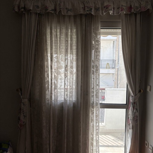 Curtain set used, 5 pieces with floral embroidered sheer and blackout curtains