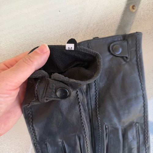 Black leather gloves
