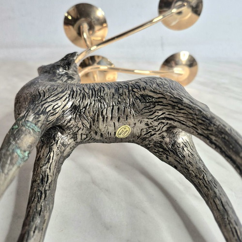 Vintage metal deer-shaped candle holder used