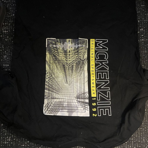 McKenzie shirt like new, size small, black multicolor