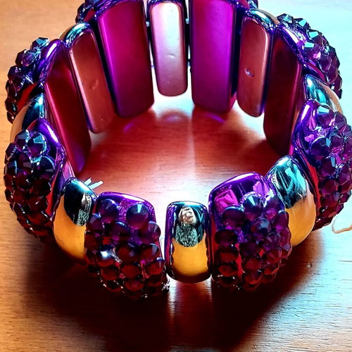 Bracelet with purple rhinestones and silver elements like new