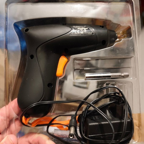 Rechargeable electric screwdriver used with charger and bit