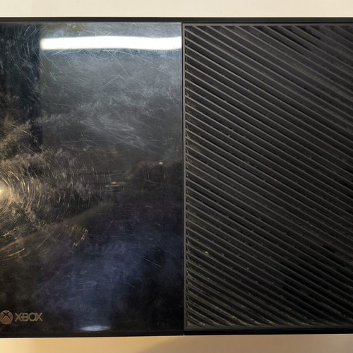 Microsoft Xbox One console with power supply for repair or parts, used