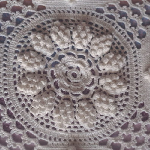 Handmade super double blanket with embossed designs and crocheted fringes