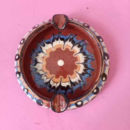 Clay ashtray folklore like new