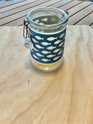 Decorative glass lantern with summer theme like new