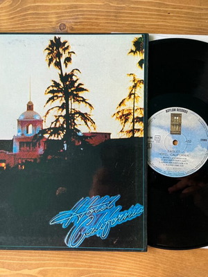 Eagles Hotel California vinyl record used with poster