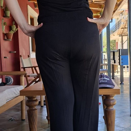 Women's jumpsuit used, size L, black with stones and zipper