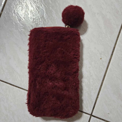 Red fluffy wallet used
