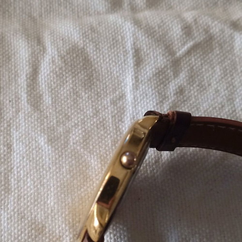 Benetton unisex watch like new, gold color