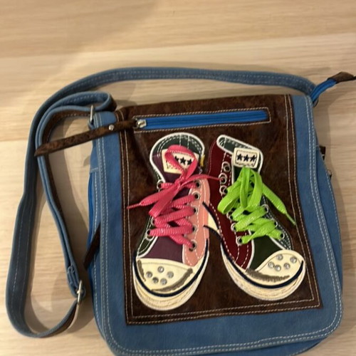 Denim and brown crossbody shoulder bag with sneaker details