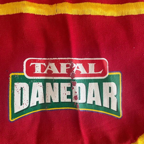 Kitchen apron used with worn logo