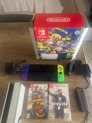 Nintendo Switch OLED Splatoon 3 издание като нов с игри Super Mario и FIFA