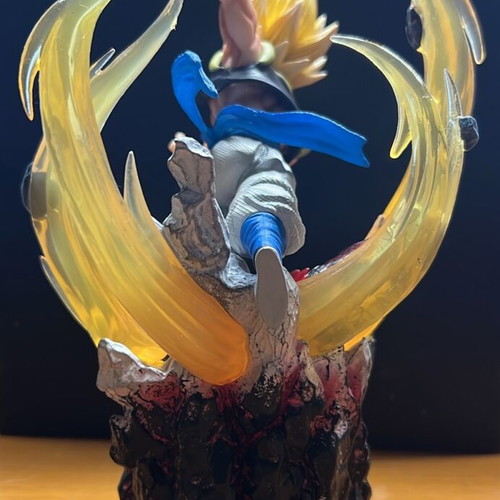Dragonball figure in battle scene with effects new