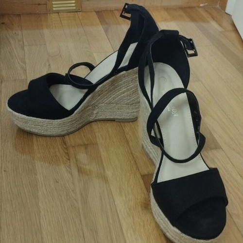 Black platform shoes used with strap wear, size 39