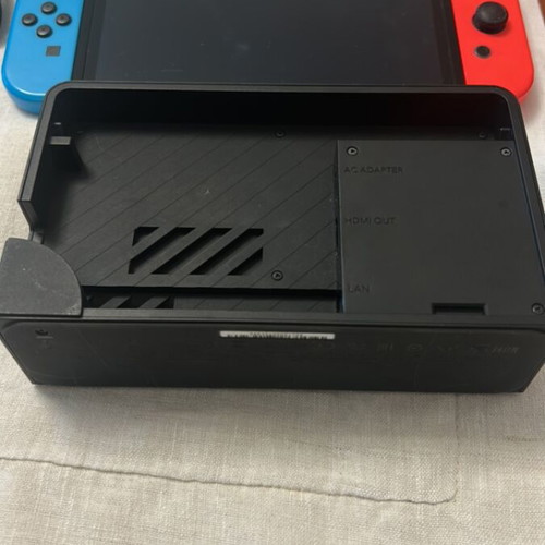 Nintendo Switch OLED 64GB console, Neon Blue and Neon Red