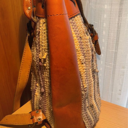 Vintage backpack with leather and woven multicolor design like new