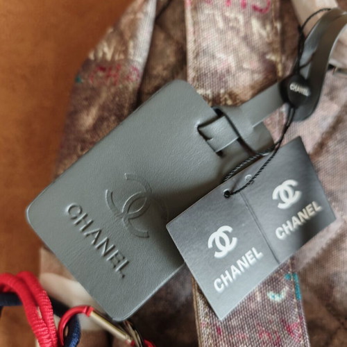 Chanel Graffiti backpack, size 40cm, beige canvas