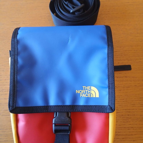 North Face crossbody bag like new, colorful