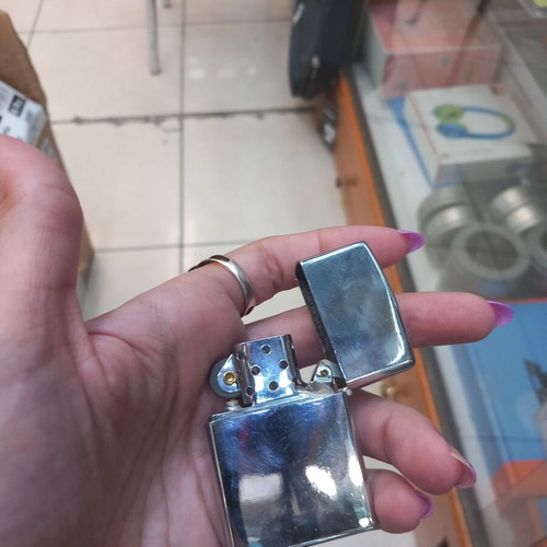 Zippo lighter with Bob Marley expression, new