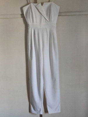 Paranoia jumpsuit size L like new, broken white with cross neckline