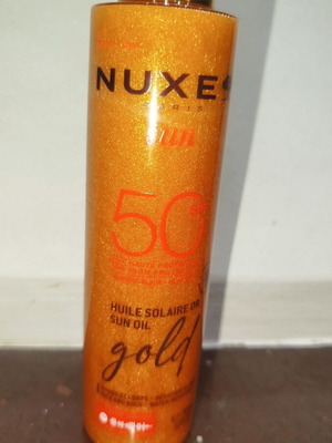 Nuxe Sun Oil Gold SPF 50 new, iridescent sunscreen oil