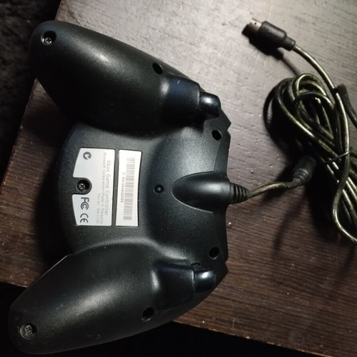 Original Microsoft Xbox console with controller and cables