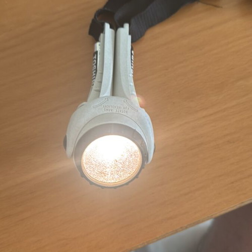 Head and hand flashlight used with conventional bulb